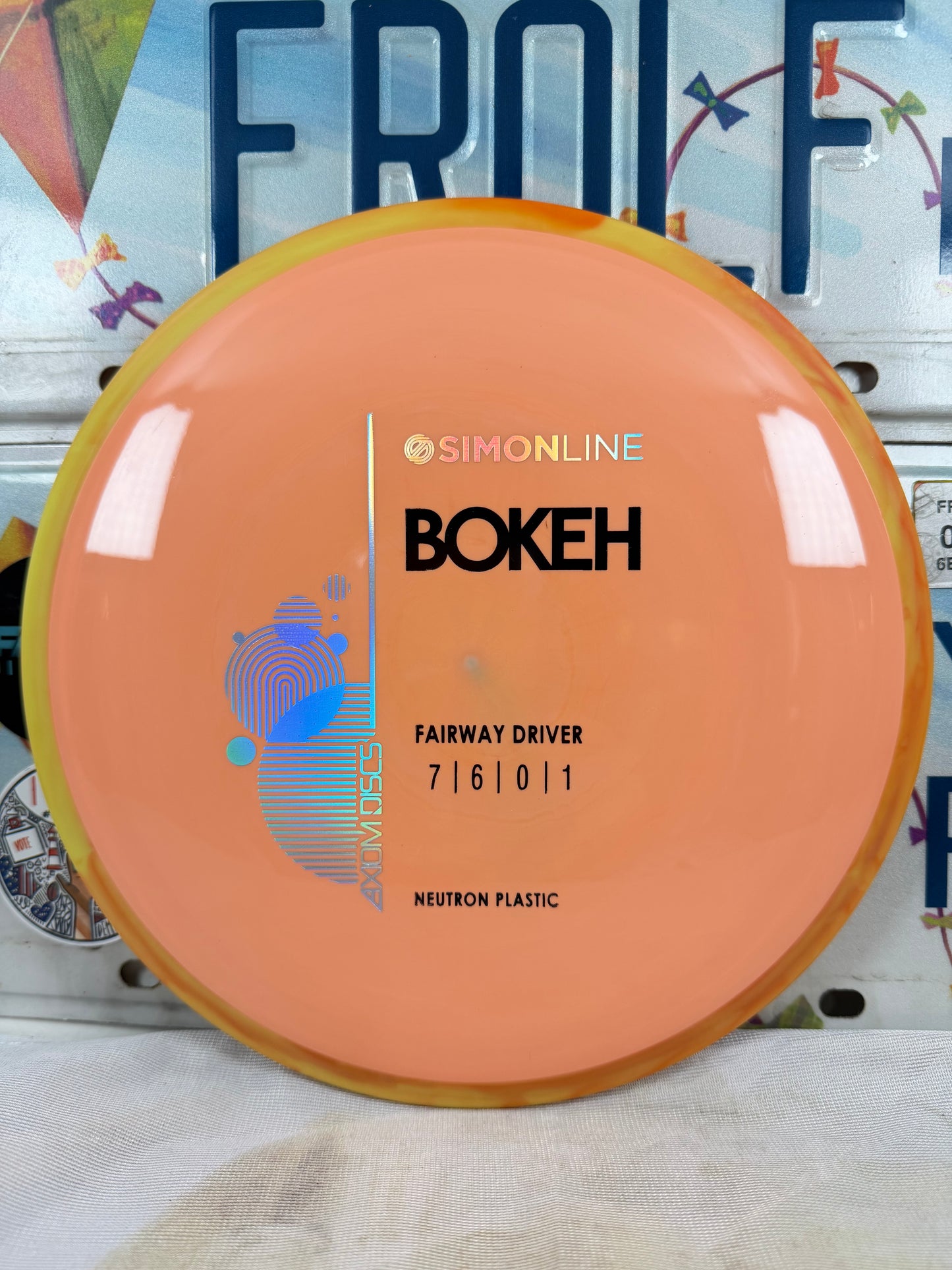 Axiom Bokeh Neutron Orange 168g Fairway Driver