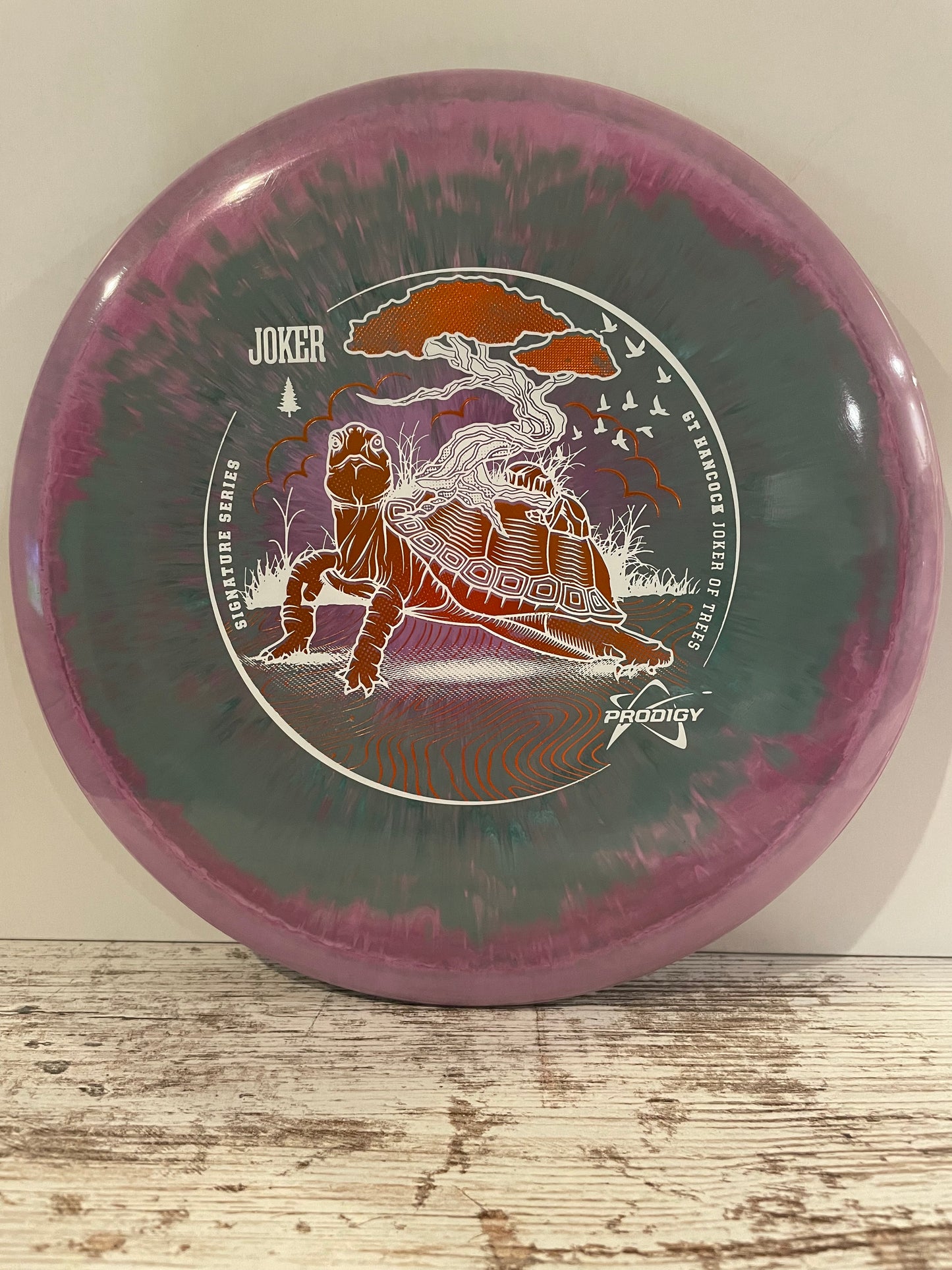 Prodigy M2 500 Spectrum GT Hancock Joker of Trees Signature Series Midrange Pink-Teal 178g
