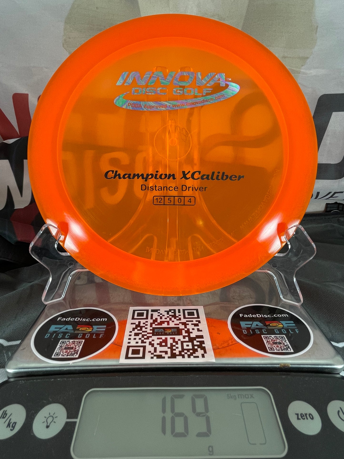 Innova XCaliber Champion 169g Orange w/ Oil Slick Foil Distance Driver